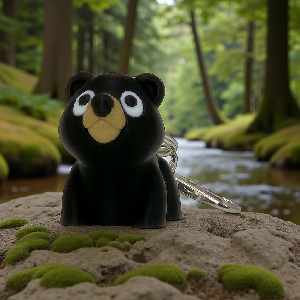 dolibarr:1427:BCL-AC-KEY-BBER-BlackBearKeychainSQ-Photoroom.jpg:sha256=56d080728be3