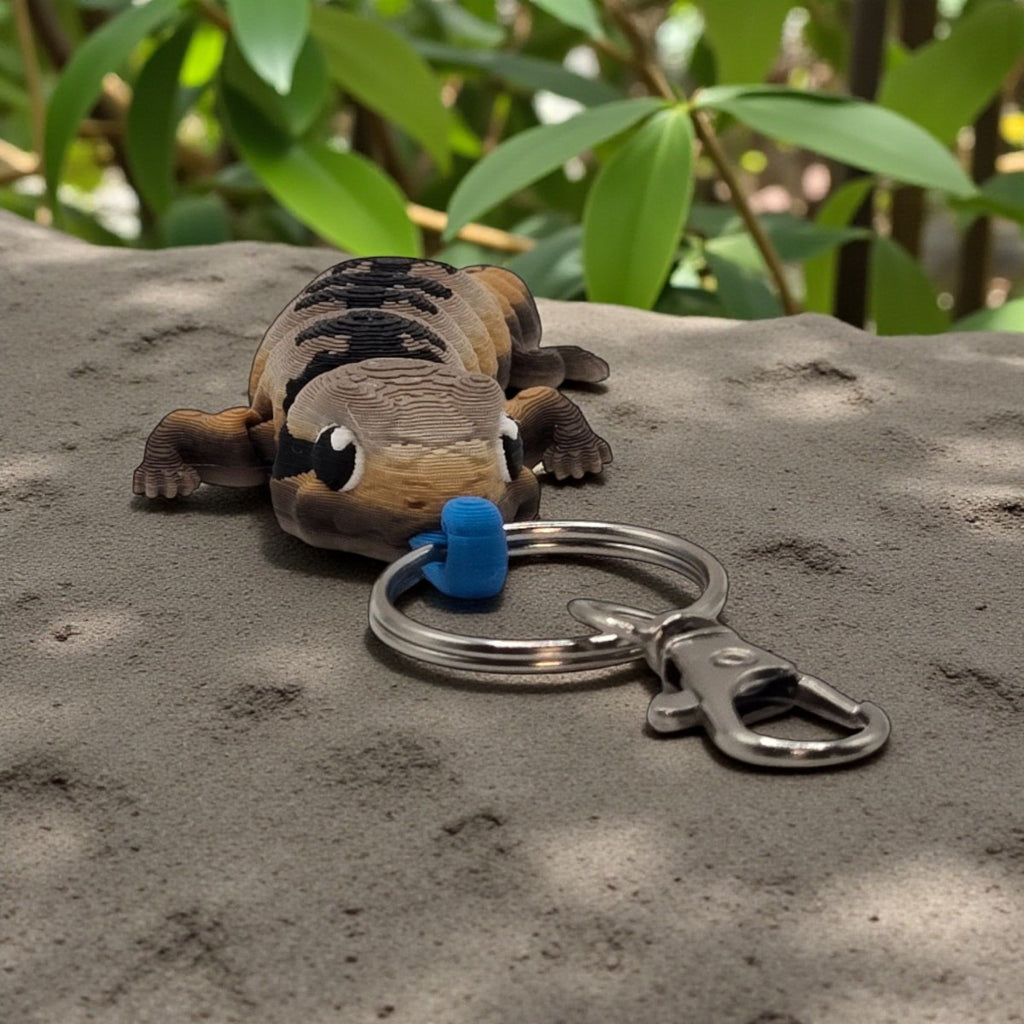 dolibarr:1386:BCL-AC-KEY-CBTS-KeychainChibiBlueTongueSkinkSQ-Photoroom.jpg:sha256=37809ce424a2