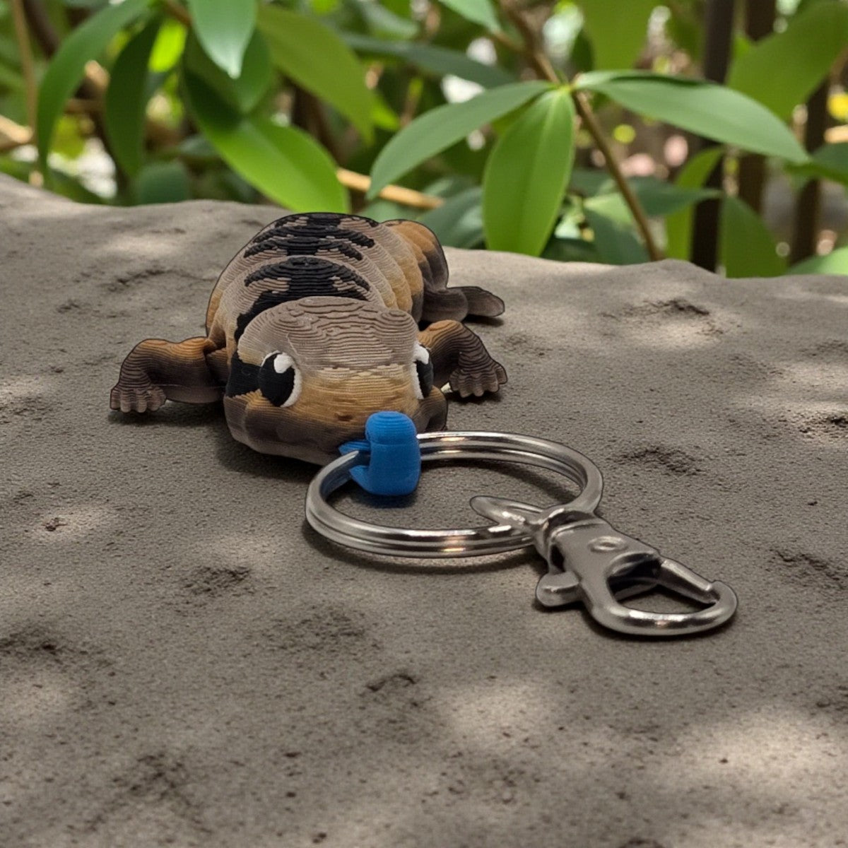 dolibarr:1386:BCL-AC-KEY-CBTS-KeychainChibiBlueTongueSkinkSQ-Photoroom.jpg:sha256=37809ce424a2