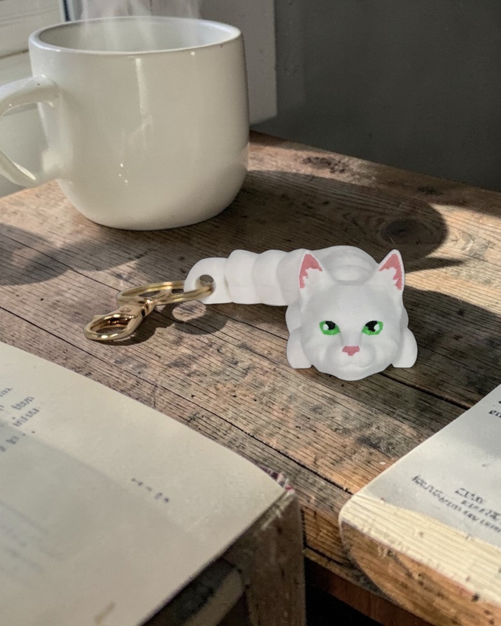 dolibarr:2121:BCL-AC-KEY-CWTE-White Cat KeychainSQ1-Photoroom.jpg:sha256=e3976c09b6dd
