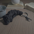 dolibarr:1814:BCL-AC-KEY-DLBB-Black Labrador Retriever KeychainSQ-Photoroom.jpg:sha256=c4b0962f0f37