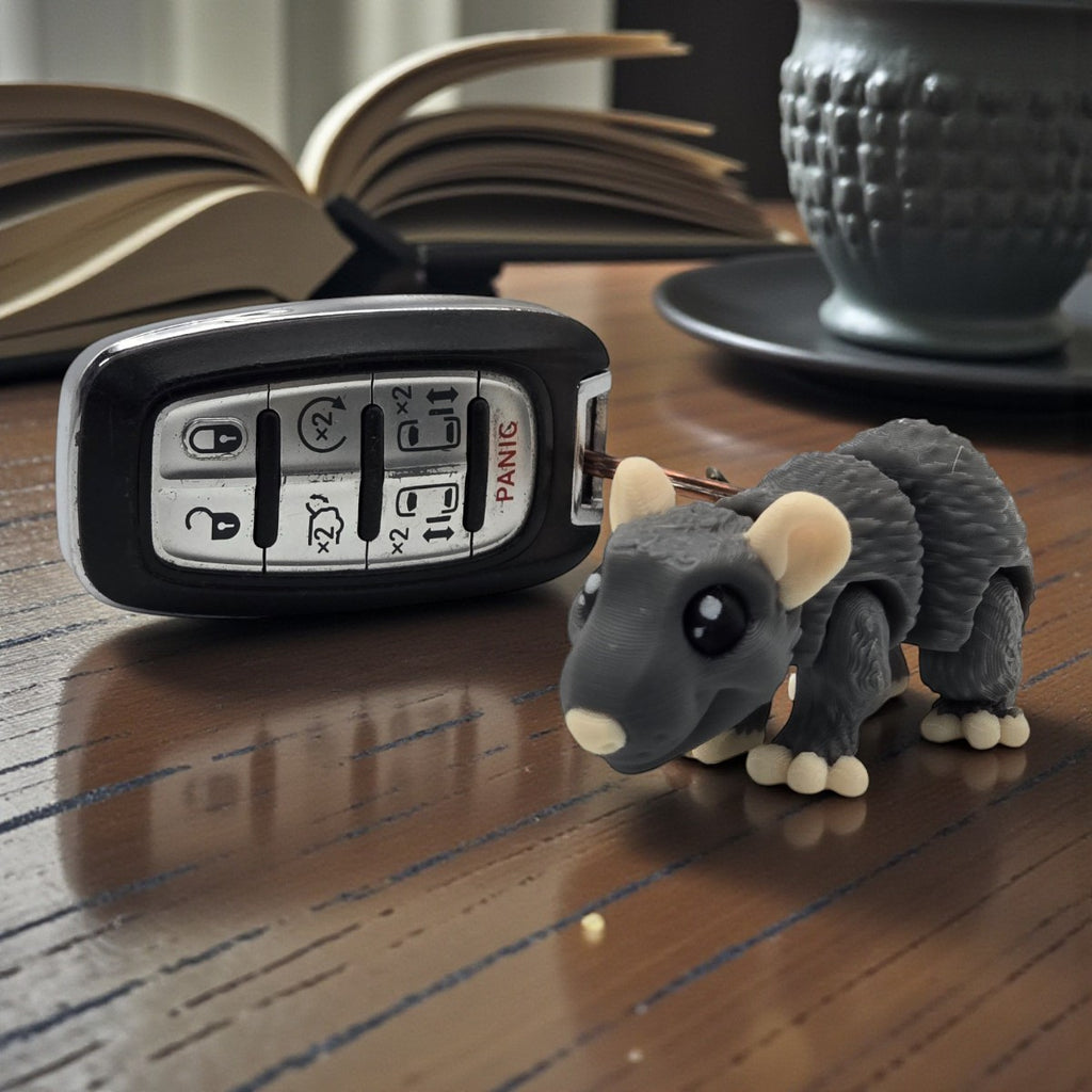 dolibarr:1184:BCL-AC-KEY-RATT-Rat KeychainSQ-Photoroom.jpg:sha256=7237ce6ea356