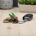 dolibarr:740:BCL-AC-KEY-TPIZ-Pizza Turtle Keychain SQ-Photoroom-Photoroom.jpg:sha256=cf2db6be30d1